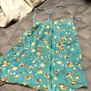 Teal tank top with flowers on it